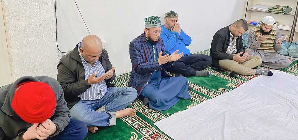 Conducting prayer ceremony at Minhaj ul Quran Islamic Center Johannesburg