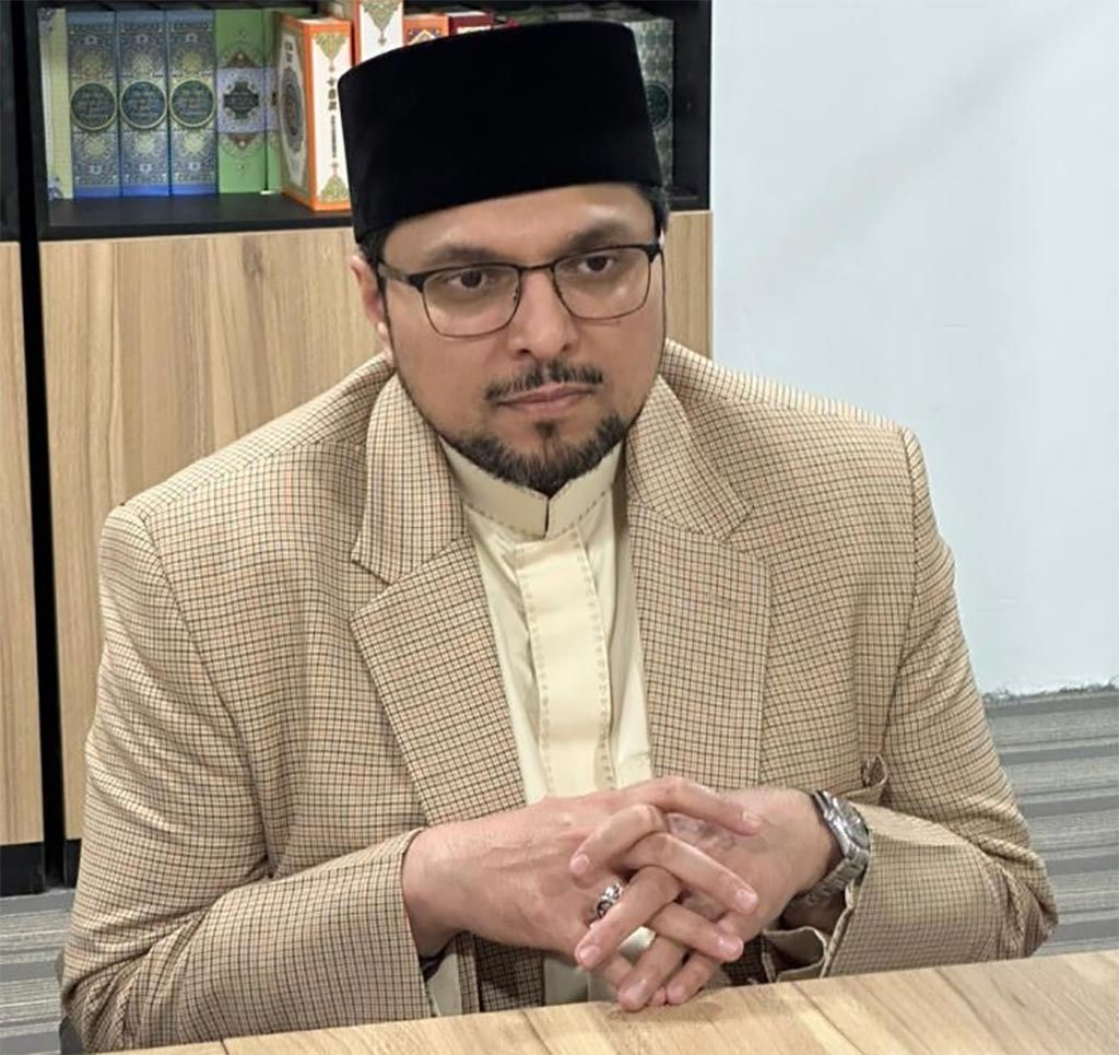 Prof. Dr. Hussain Mohi-ud-Din Qadri presiding over MoU between Minhaj-ul-Qur’an Malaysia and Nasyrul Quran for distribution of Qur’an translations